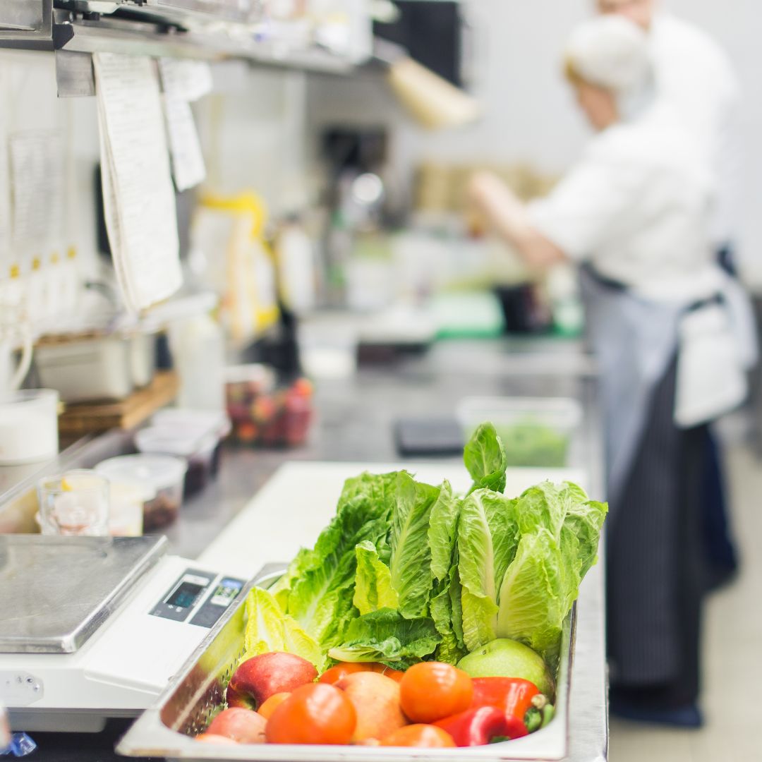 people working in catering kitchen